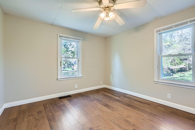 595 Collingwood Ave, Columbus, OH 43213 - empty room featuring baseboards, a ceiling fan, visible vents, and wood-type flooring
