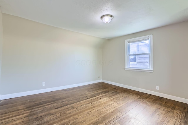 595 Collingwood Ave, Columbus, OH 43213 - spare room featuring dark wood finished floors and baseboards