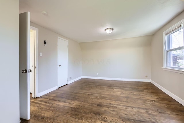 595 Collingwood Ave, Columbus, OH 43213 - unfurnished room with baseboards and dark wood-style floors