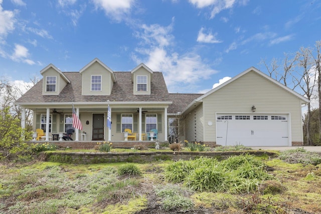 1649 Loudon St, Granville, OH 43023 - cape cod house with concrete driveway, a ceiling fan, a shingled roof, a porch, and a garage