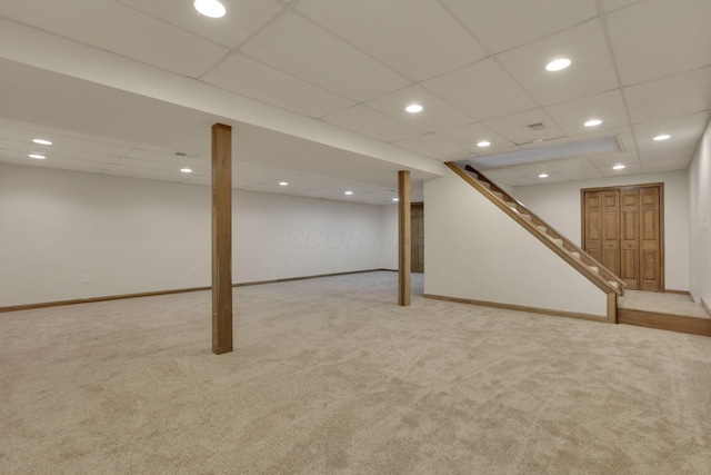1649 Loudon St, Granville, OH 43023 - finished basement featuring stairs, a drop ceiling, carpet, baseboards, and recessed lighting