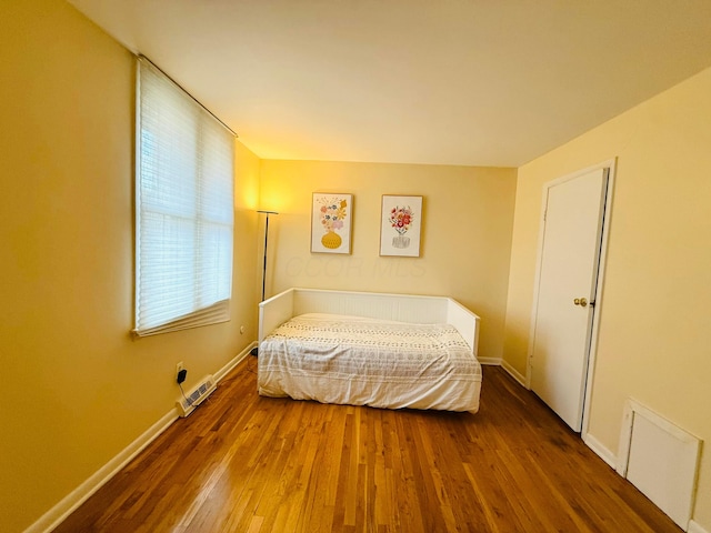 1610 Lafayette Dr Unit 1610, Columbus, OH 43220 - bedroom with dark wood-style floors and baseboards