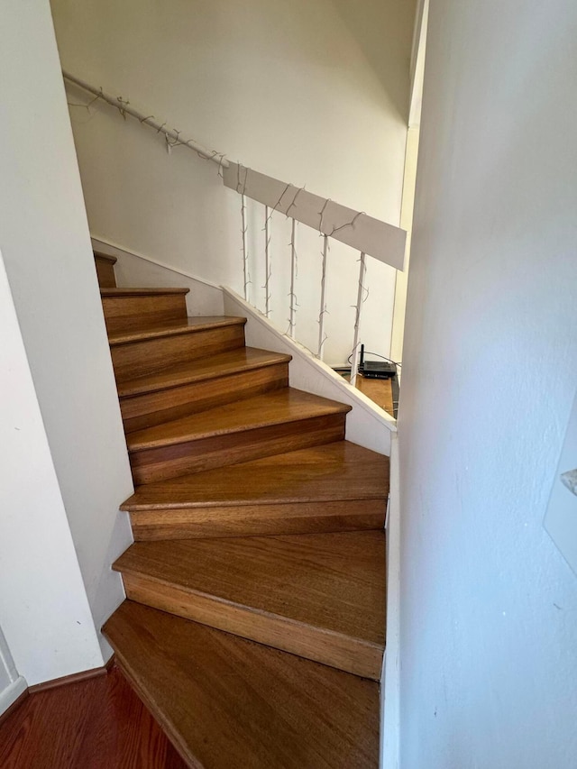 1610 Lafayette Dr Unit 1610, Columbus, OH 43220 - staircase with wood finished floors and baseboards
