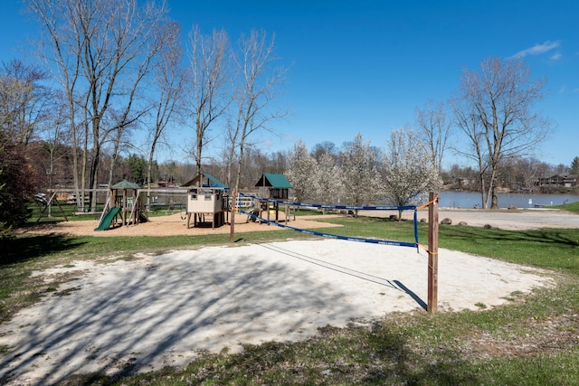 view of community with playground community and a water view