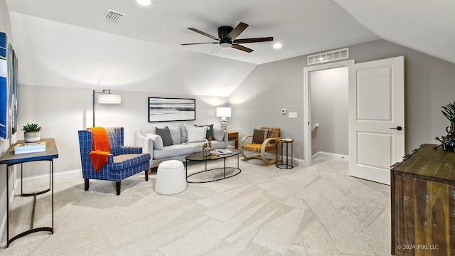 carpeted living area featuring ceiling fan, lofted ceiling, visible vents, and baseboards