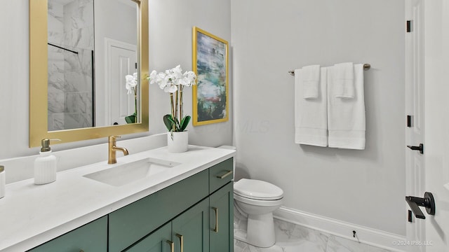 full bathroom with marble finish floor, baseboards, toilet, and vanity