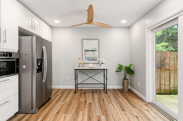 3588 Reed Rd Unit 4, Columbus, OH 43221 - kitchen with appliances with stainless steel finishes, light wood-style flooring, white cabinets, a ceiling fan, and recessed lighting