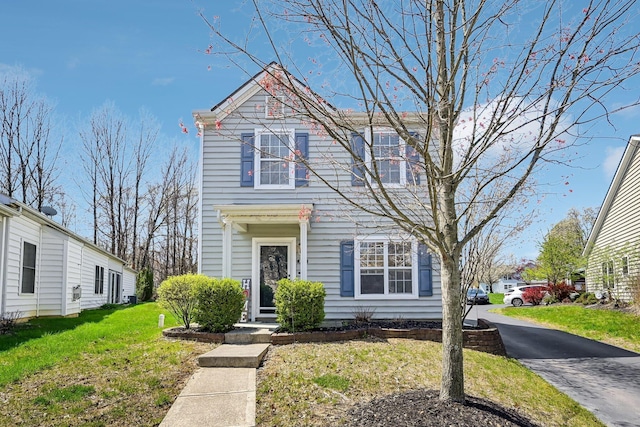 view of front of house with a front lawn