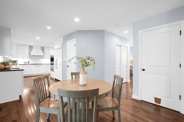 dining space with recessed lighting and dark wood-style floors