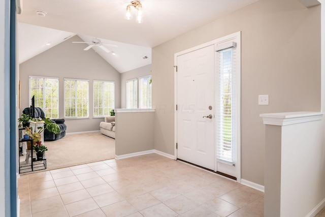 4889 Ashleigh Dr, Dublin, OH 43016 - entryway featuring light tile patterned floors, baseboards, ceiling fan, vaulted ceiling, and light carpet
