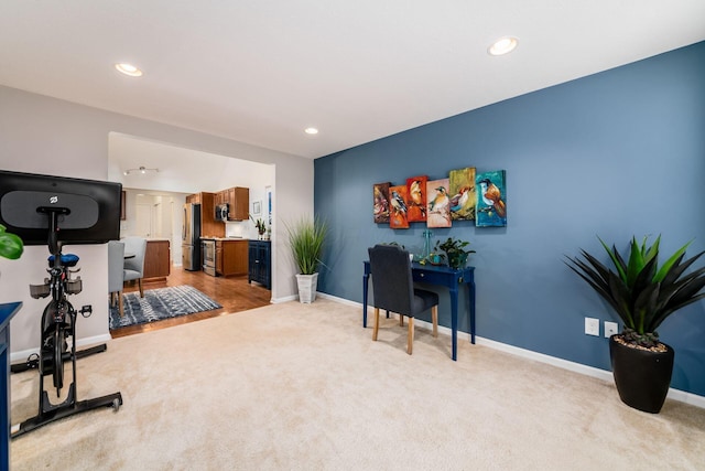 4889 Ashleigh Dr, Dublin, OH 43016 - exercise room featuring light carpet, recessed lighting, and baseboards