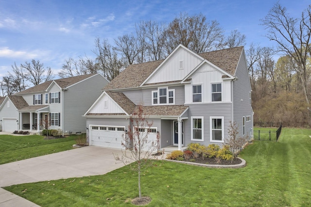 traditional home featuring a shingled roof, board and batten siding, concrete driveway, and a front lawn