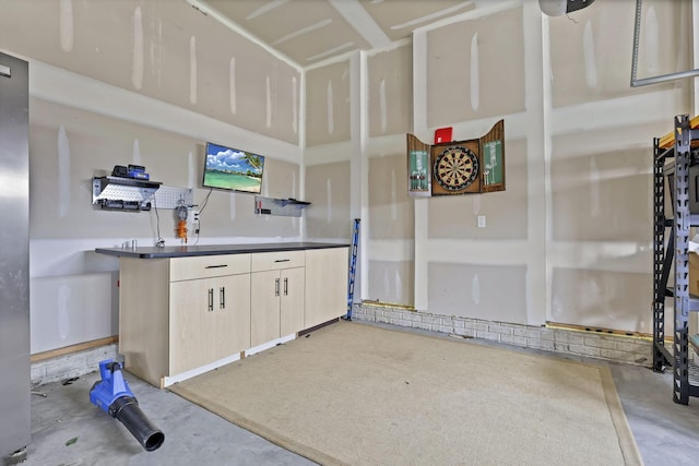 kitchen with unfinished concrete floors