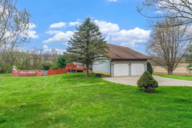 8778 Township Rd 36, Somerset, OH 43783 - view of home's exterior featuring a yard, driveway, and a wooden deck