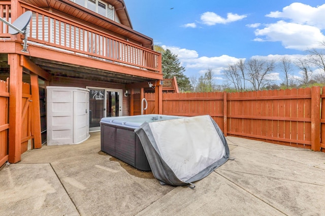 8778 Township Rd 36, Somerset, OH 43783 - view of patio featuring a fenced backyard and a hot tub