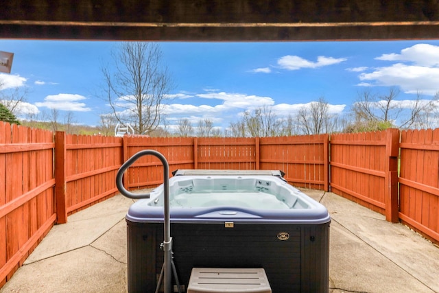 8778 Township Rd 36, Somerset, OH 43783 - view of patio / terrace with a fenced backyard and a hot tub