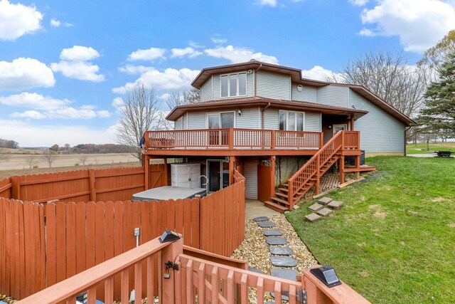 8778 Township Rd 36, Somerset, OH 43783 - back of house featuring a deck, stairs, fence, and a lawn