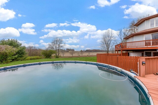 8778 Township Rd 36, Somerset, OH 43783 - view of swimming pool featuring a wooden deck, a fenced in pool, and fence