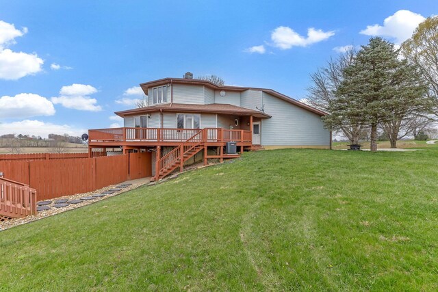 8778 Township Rd 36, Somerset, OH 43783 - rear view of property featuring a chimney, stairway, a yard, a deck, and fence