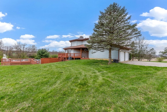 8778 Township Rd 36, Somerset, OH 43783 - view of yard with a garage, a deck, and driveway