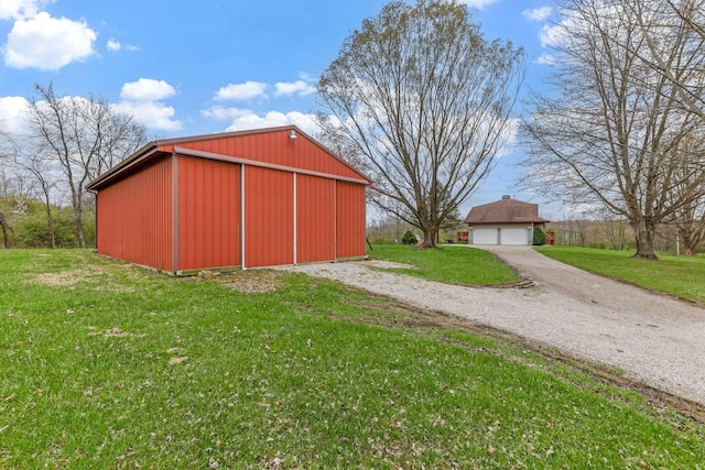 8778 Township Rd 36, Somerset, OH 43783 - view of pole building featuring a yard and driveway
