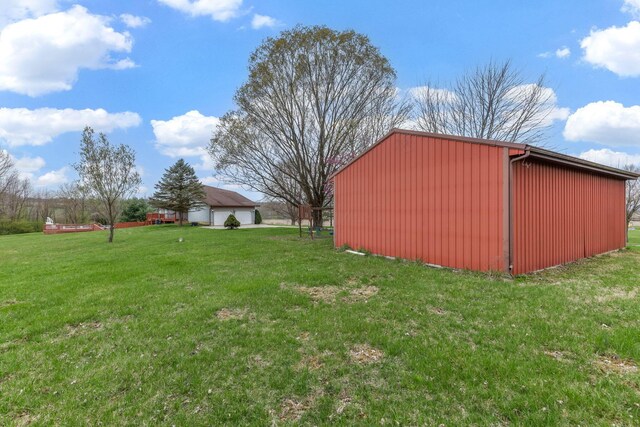 8778 Township Rd 36, Somerset, OH 43783 - view of yard featuring an outbuilding, a pole building, and a garage