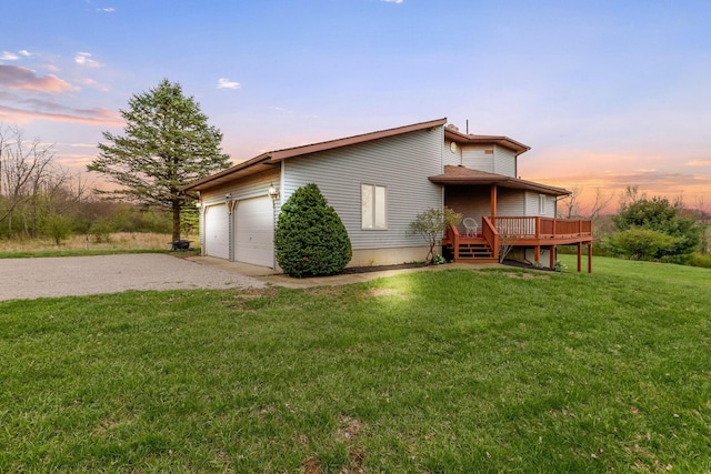 8778 Township Rd 36, Somerset, OH 43783 - property exterior at dusk featuring a deck, a yard, and gravel driveway