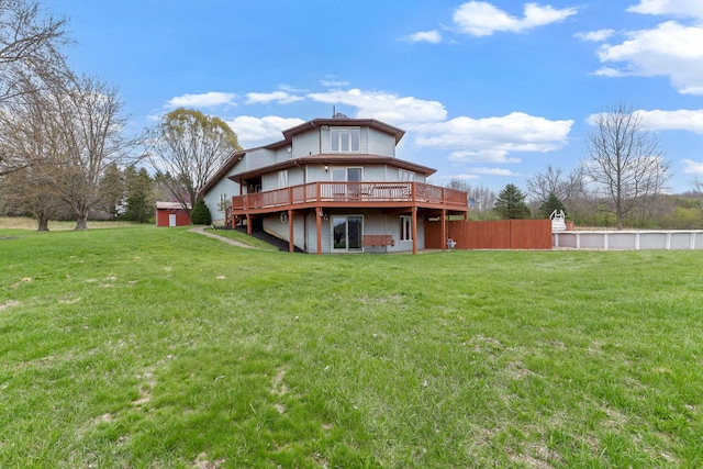 8778 Township Rd 36, Somerset, OH 43783 - back of house with fence, a deck, and a lawn