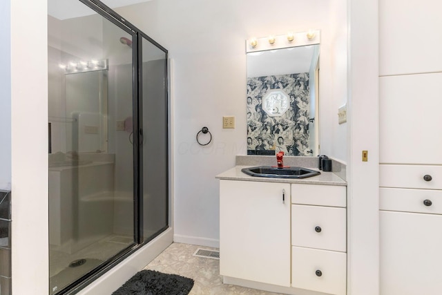 8778 Township Rd 36, Somerset, OH 43783 - bathroom with vanity, visible vents, baseboards, and a stall shower