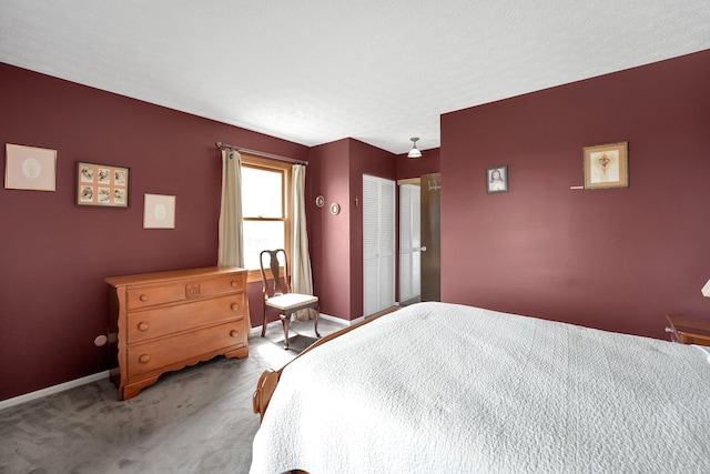 6346 Well Fleet Dr Unit 96, Columbus, OH 43231 - bedroom featuring a closet, baseboards, and carpet flooring