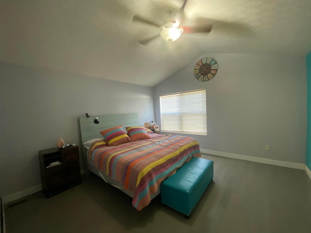 bedroom with baseboards, a ceiling fan, and vaulted ceiling
