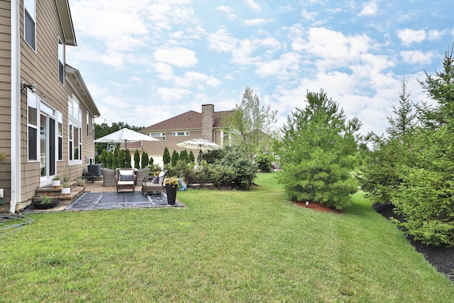 view of yard featuring outdoor lounge area, a patio, entry steps, and central AC
