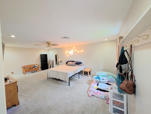 carpeted bedroom featuring visible vents, ceiling fan, and recessed lighting