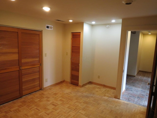 11 Plumb St, Lockbourne, OH 43137 - unfurnished bedroom featuring visible vents, recessed lighting, and two closets