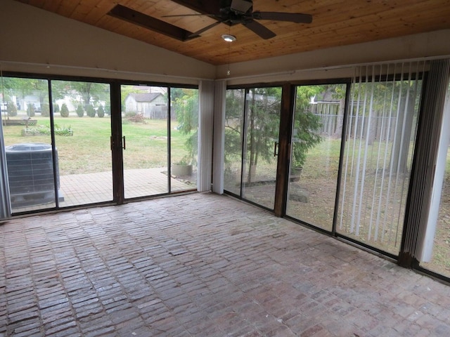 11 Plumb St, Lockbourne, OH 43137 - unfurnished sunroom featuring brick floor, ceiling fan, wood ceiling, and lofted ceiling