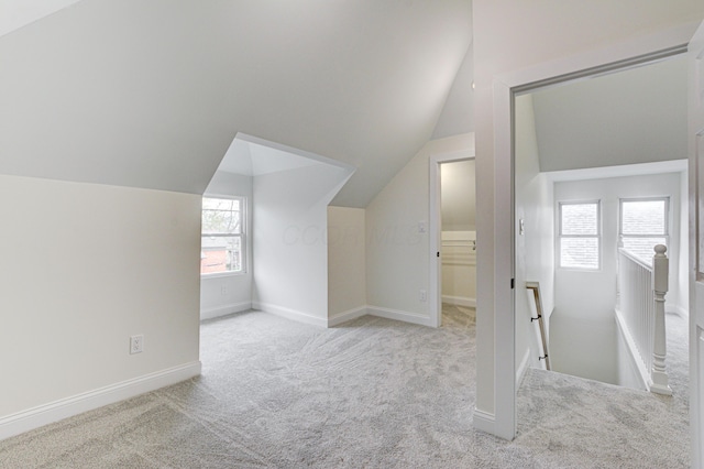 344 E Whittier St, Columbus, OH 43206 - additional living space with lofted ceiling, carpet, and baseboards