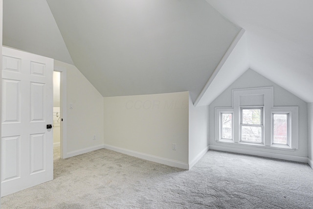 344 E Whittier St, Columbus, OH 43206 - bonus room featuring carpet, vaulted ceiling, and baseboards
