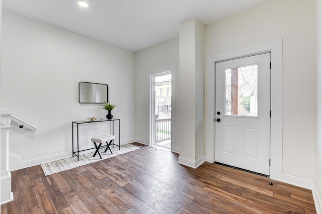 344 E Whittier St, Columbus, OH 43206 - foyer entrance with a wealth of natural light, wood finished floors, and baseboards