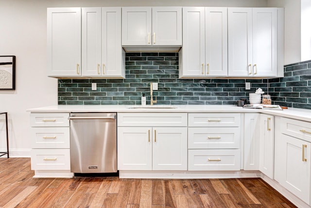 344 E Whittier St, Columbus, OH 43206 - kitchen featuring a sink, dishwasher, light wood-style flooring, and light countertops