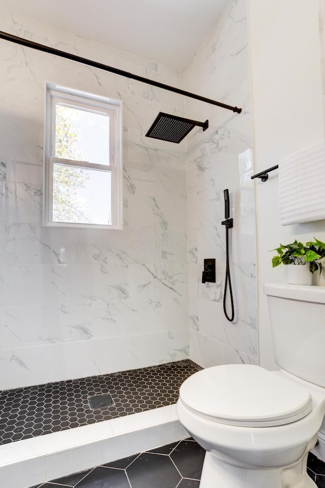 344 E Whittier St, Columbus, OH 43206 - bathroom featuring toilet and a marble finish shower