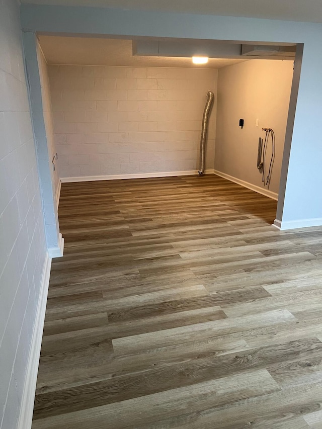 laundry room featuring wood finished floors