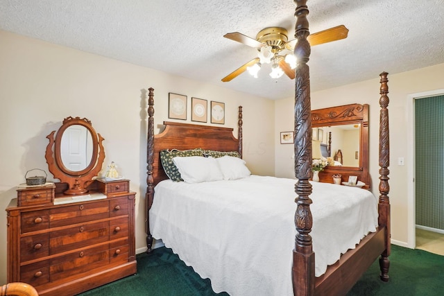 bedroom with a textured ceiling, a ceiling fan, and carpet floors