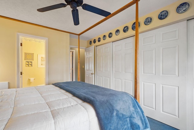 bedroom featuring crown molding, a closet, and a ceiling fan