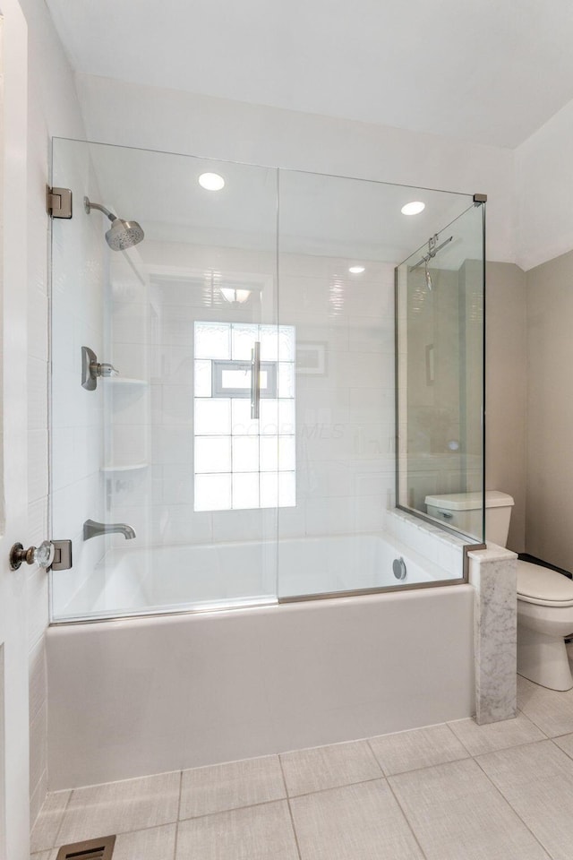 bathroom featuring tile patterned floors, recessed lighting, bath / shower combo with glass door, and toilet