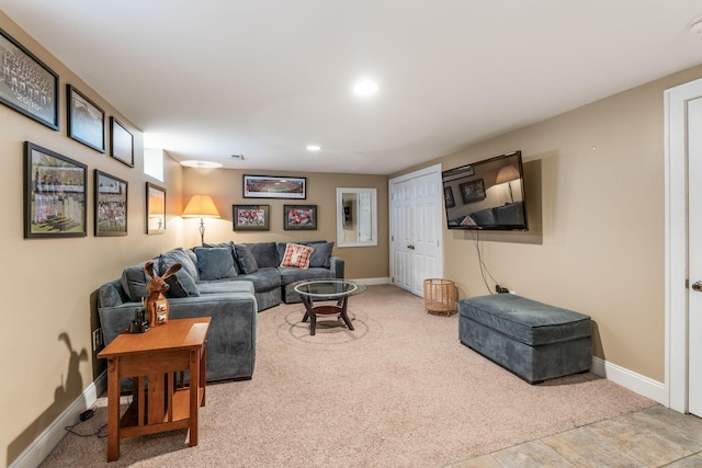 living area featuring baseboards, recessed lighting, and carpet
