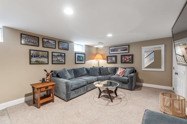 carpeted living room featuring baseboards and recessed lighting