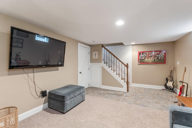 interior space with baseboards, stairway, and recessed lighting