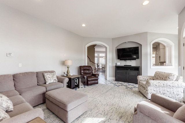 16187 Kreashbaum Rd, Rockbridge, OH 43149 - living area with arched walkways, carpet floors, baseboards, and recessed lighting