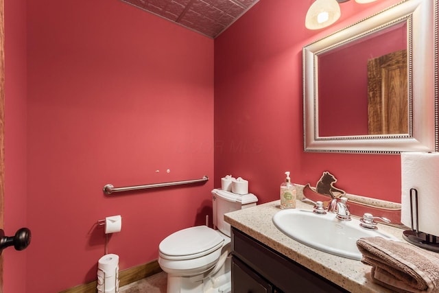 16187 Kreashbaum Rd, Rockbridge, OH 43149 - bathroom with an ornate ceiling, toilet, and vanity