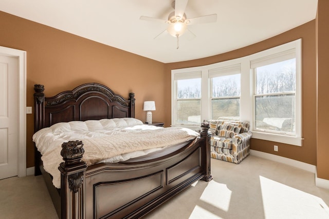 16187 Kreashbaum Rd, Rockbridge, OH 43149 - bedroom with light carpet, a ceiling fan, and baseboards